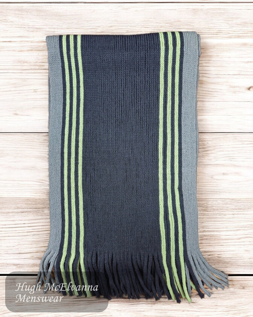 This luxurious scarf showcases a refined charcoal base, beautifully enhanced by contrasting stripes in vibrant green and soft grey.